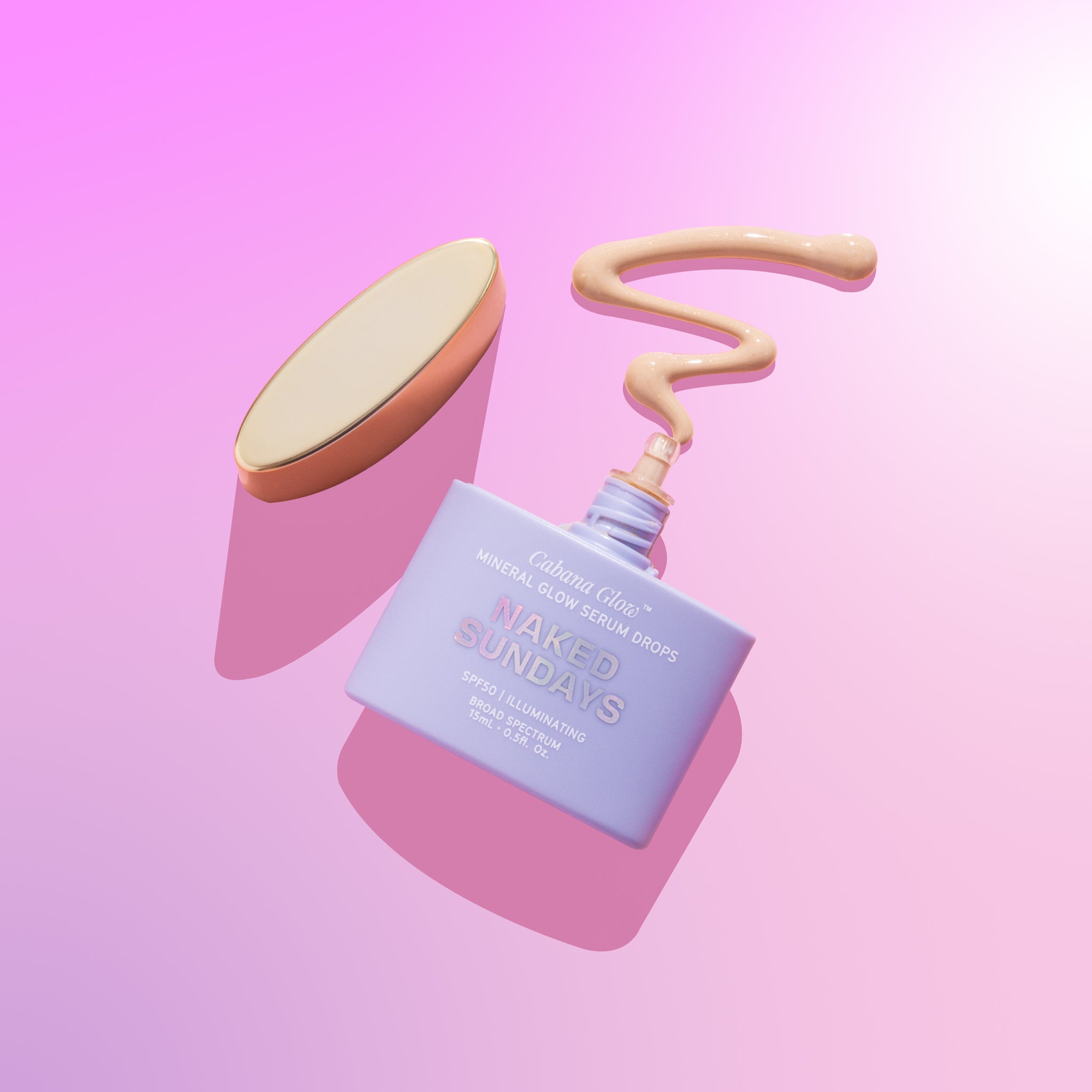 A bottle of CabanaGlow SPF50 Mineral Glow Serum Drops Mini in illuminating on a pink background.