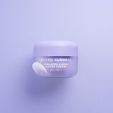 Jar of Naked Sundays Ceramide Cloud Water Cream on a lilac background
