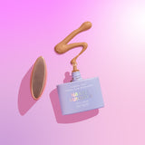 A bottle of CabanaGlow SPF50 Mineral Glow Serum Drops Mini in Bronze against a pink background.