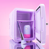 Lilac Cosmetics Fridge open with CabanaMilk SPF50 and Holographic Brush on a pink background