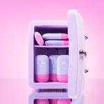 Lilac cosmetics fridge with pink and lilac CabanaMilk SPF50 products on a pink background