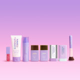 Naked Sundays Glow All Out Bundle containing Hydrating Glow Mist, Body Sunscreen Crème, Clear Glow Sun Stick, Mineral Summer Stick, Cabana Glow Bronze Serum Drops, Cabana Glow Illuminating Serum Drops, Watermelon Glow + Go Lip Oil & Brush.
